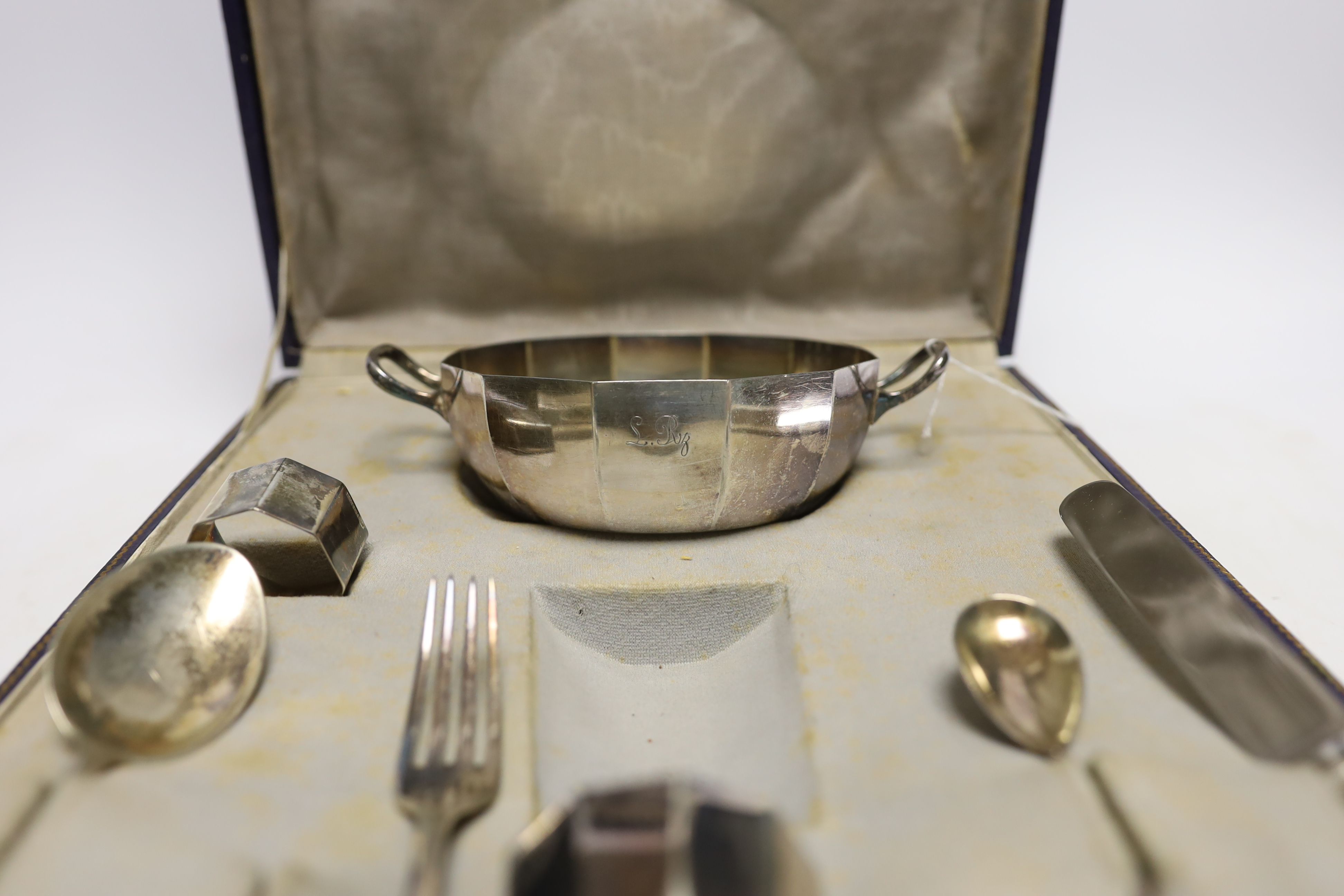 A cased matched 800 standard German eight piece breakfast set, gross weight 9.5oz.